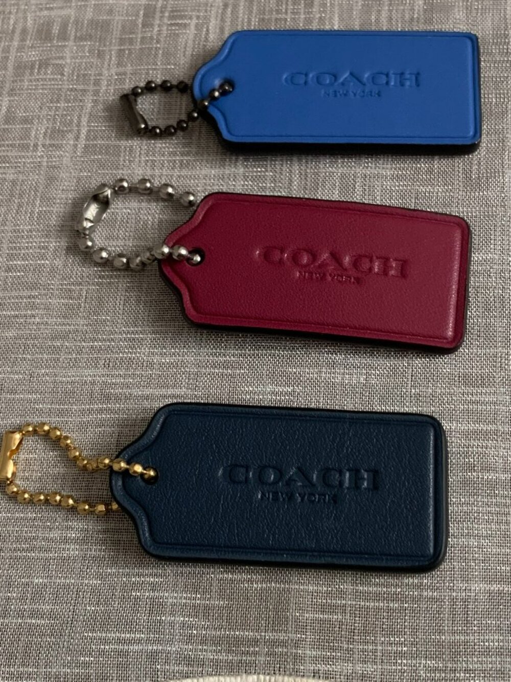 Three Coach Hang Tags